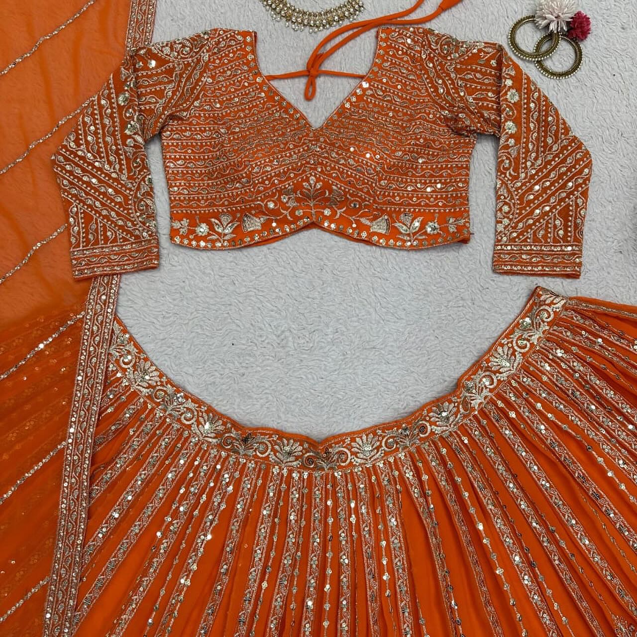 Orange Lehenga with gold thread work